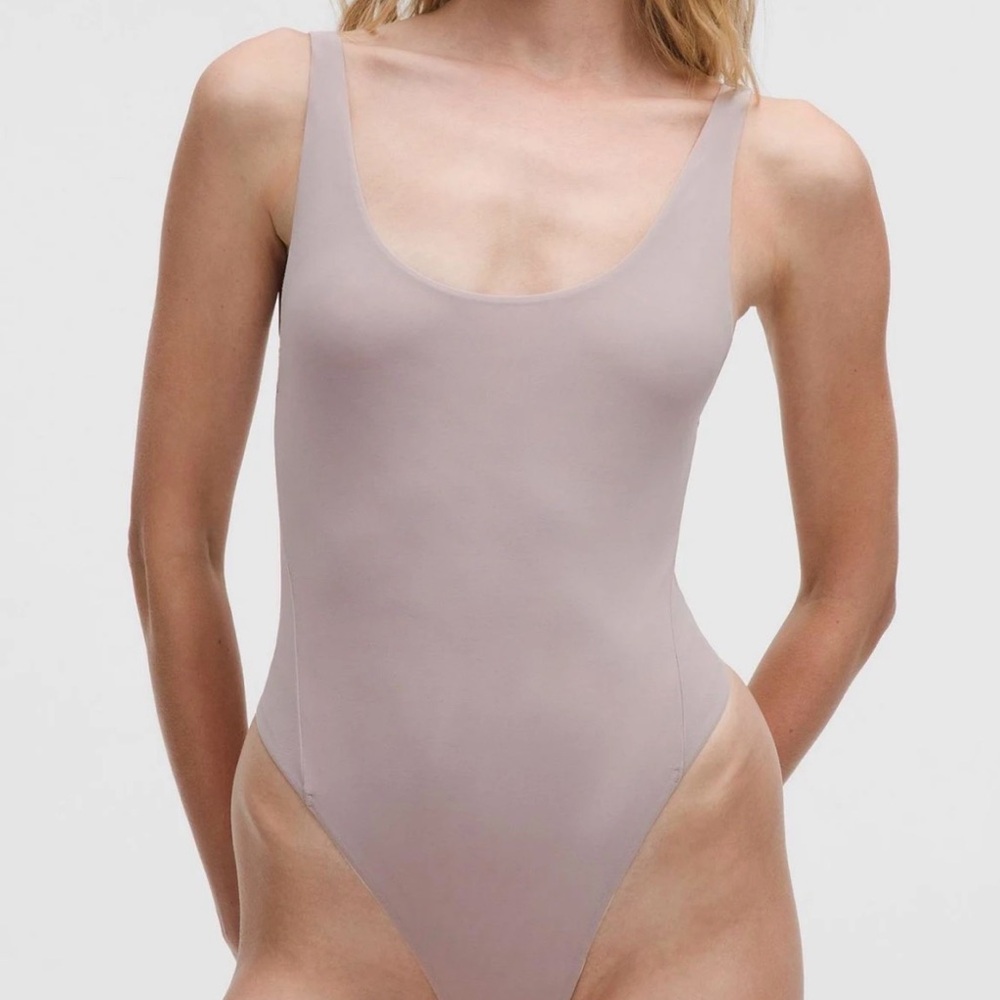 41. Lululemon Athletica Mauve Bodysuit